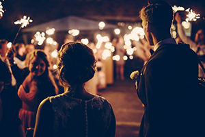 Couple at outdoor party.