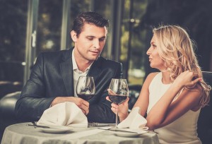 Couple talking over dinner