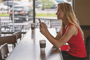 Texting in coffee shop