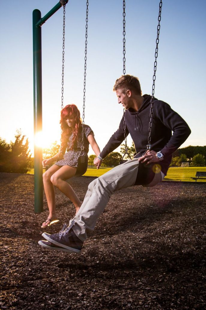 couple on swings